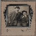  photograph of two men wearing bowler hats